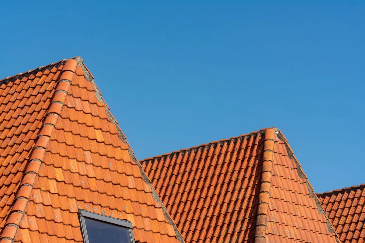 Clay barrel tile rooflines on homes in El Monte, CA